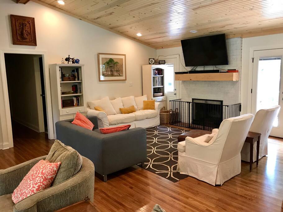 Living room with 65 inch UHD tv. Direct tv with all sports channels.