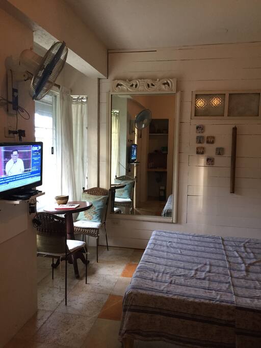 Bedroom with tv and sitting area