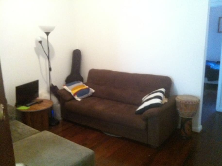 Living room, and the way into the room to the right