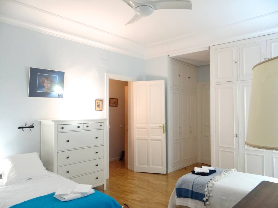 The 1st bedroom (large 26 sqm) for up to 3 guests (can be double bed and single, or 3 single beds)
