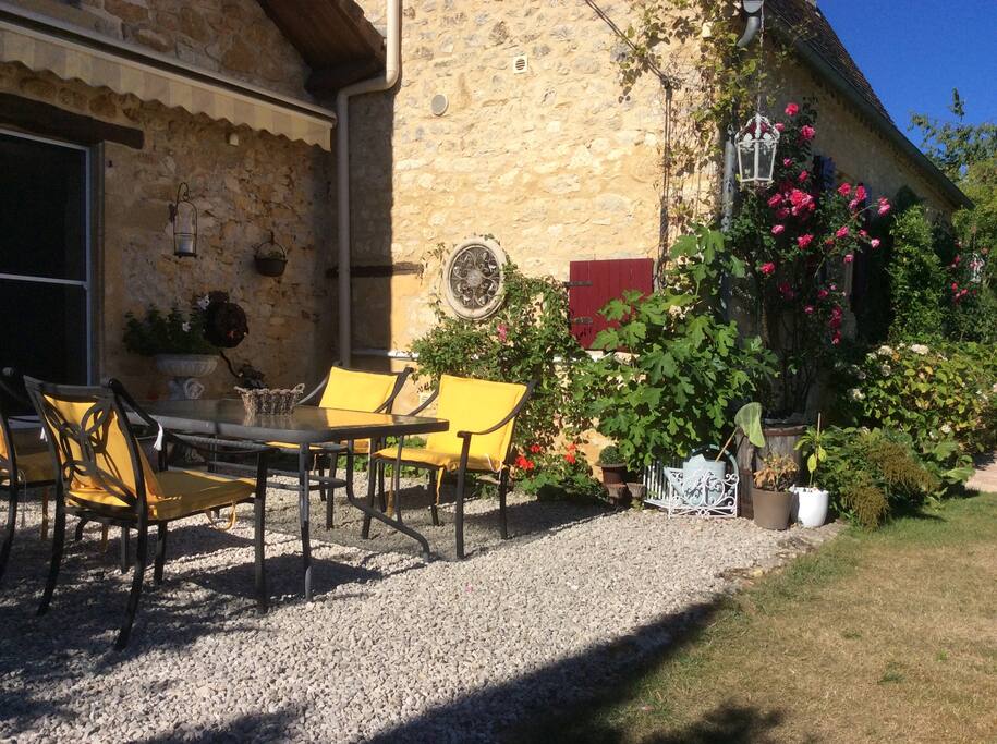 Lovely terrace overlooking the pool, Chateau of Nadaillac de Rouge and the Dordogne Valley.