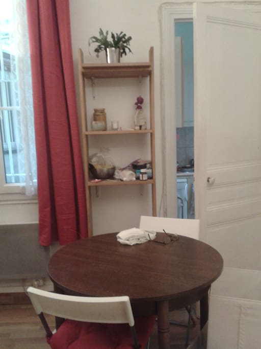 the table and the small kitchen