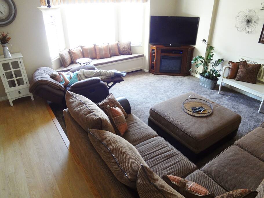 Living Room with 56" TV and Fireplace