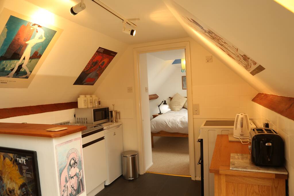 Kitchen through to bedroom