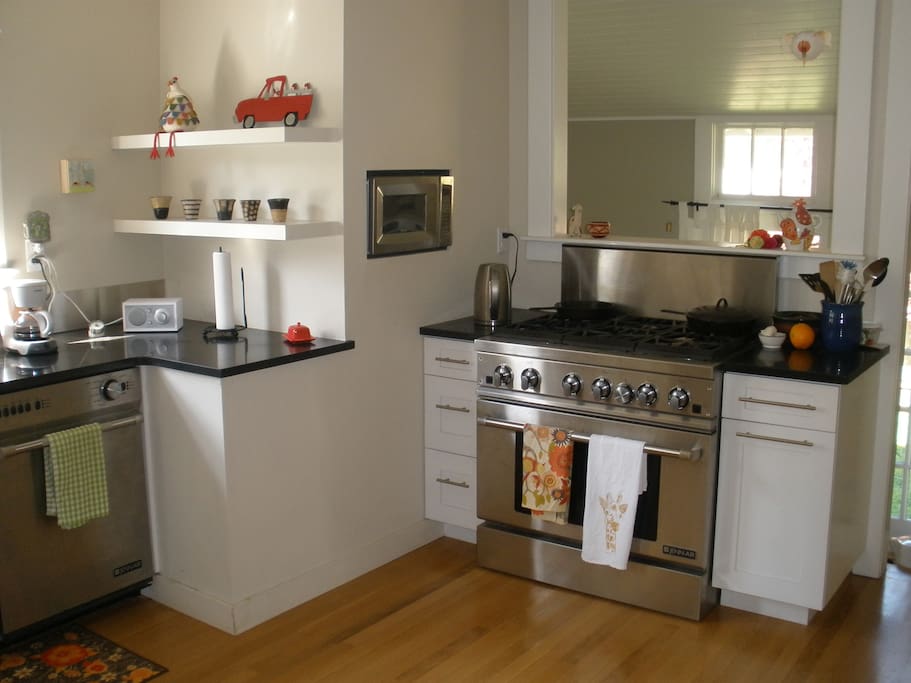 The updated kitchen includes a dishwasher and 6-burner stove.