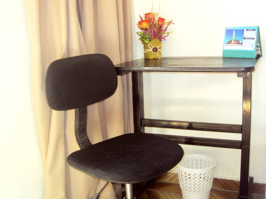 A very nice and comfortable Work-space with a Moroccan calendar.