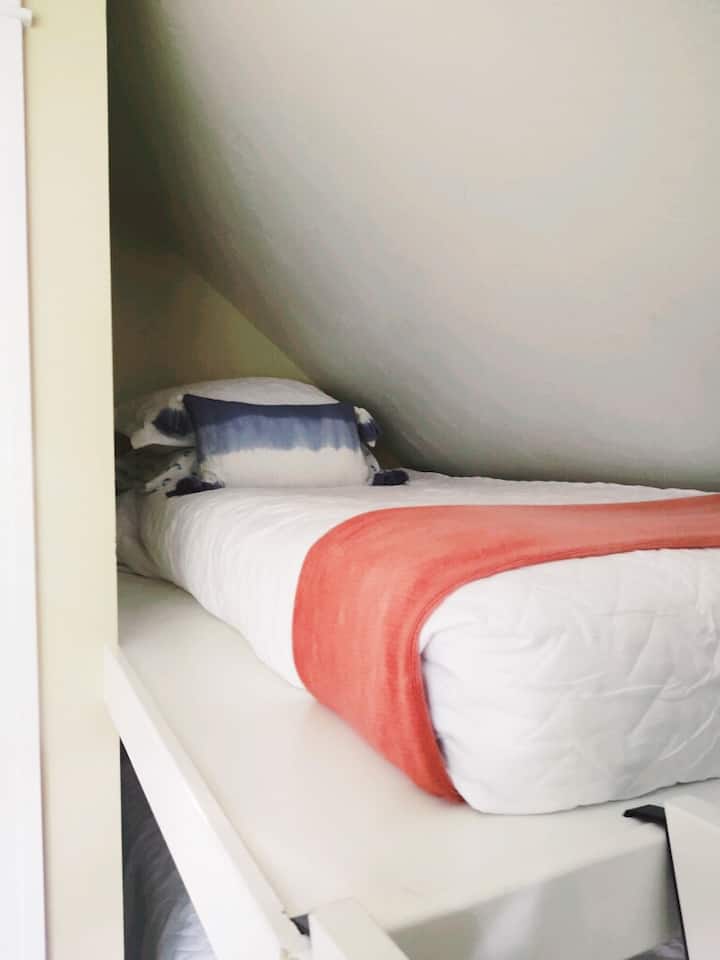 Our "bunk room" is outfitted with premium linens, and 2 twin size bunk beds.  Perfect for families or adults alike.