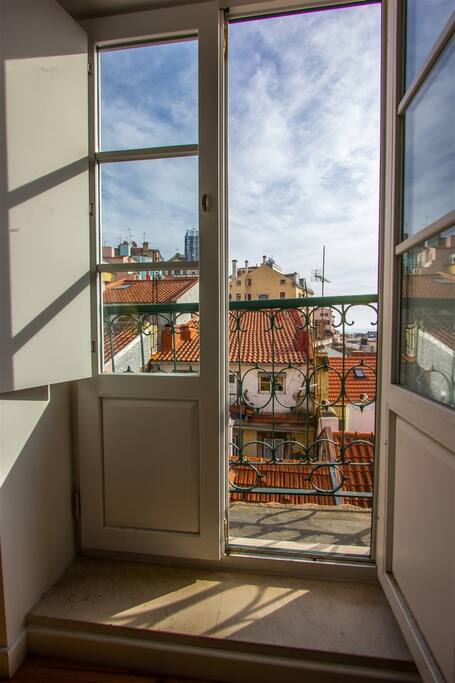 From the balcony you have a view over Lisbon