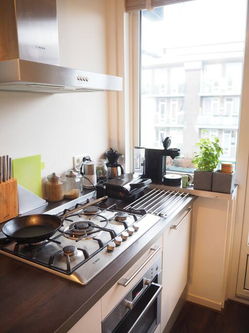 Stove with oven and microwave