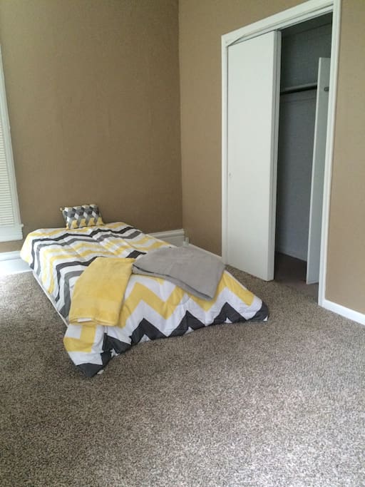 Twin bed, also has nightstand with tv and cable