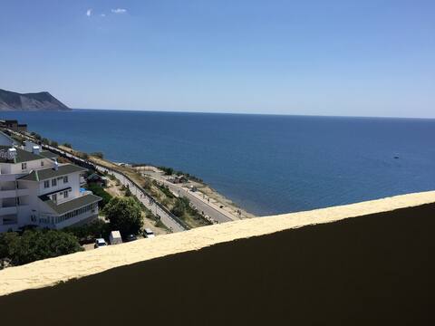 Lägenhet med utsikt över havet