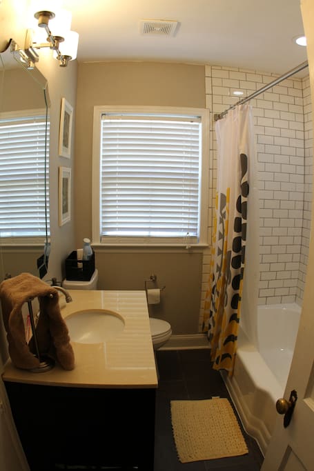 Newly remodeled bathroom with heated tile floor.