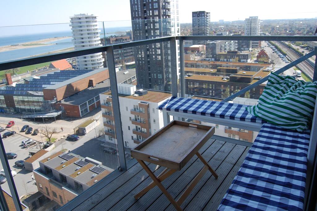 Balcony with morning sun. Enjoy your breakfast here before exploring Copenhagen.