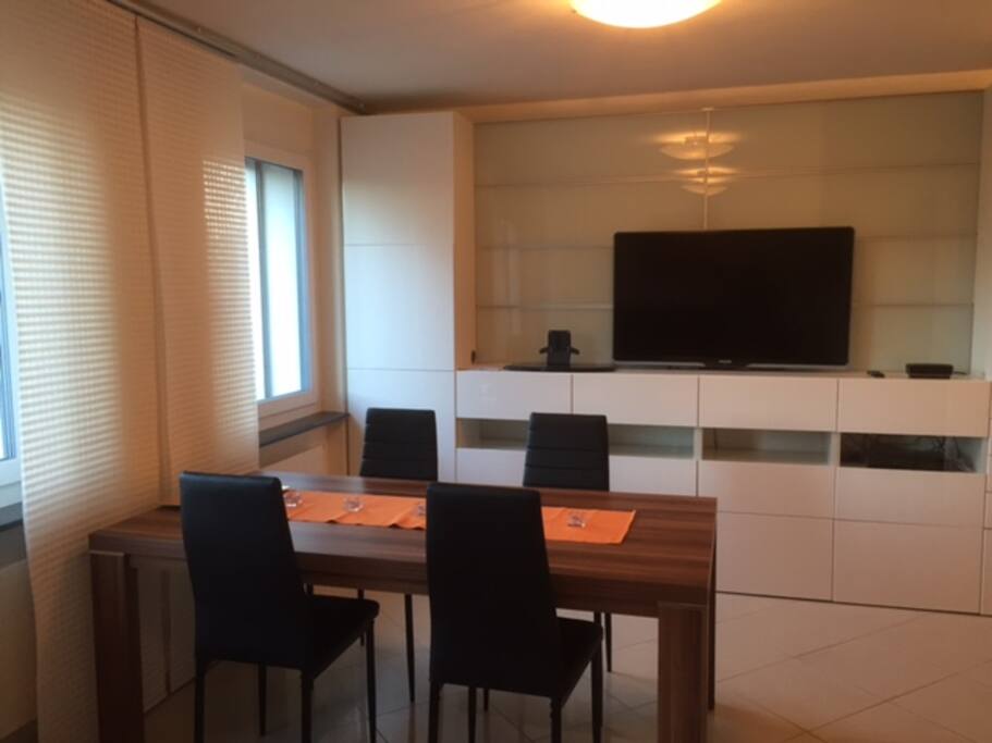 dinning area and big flat TV