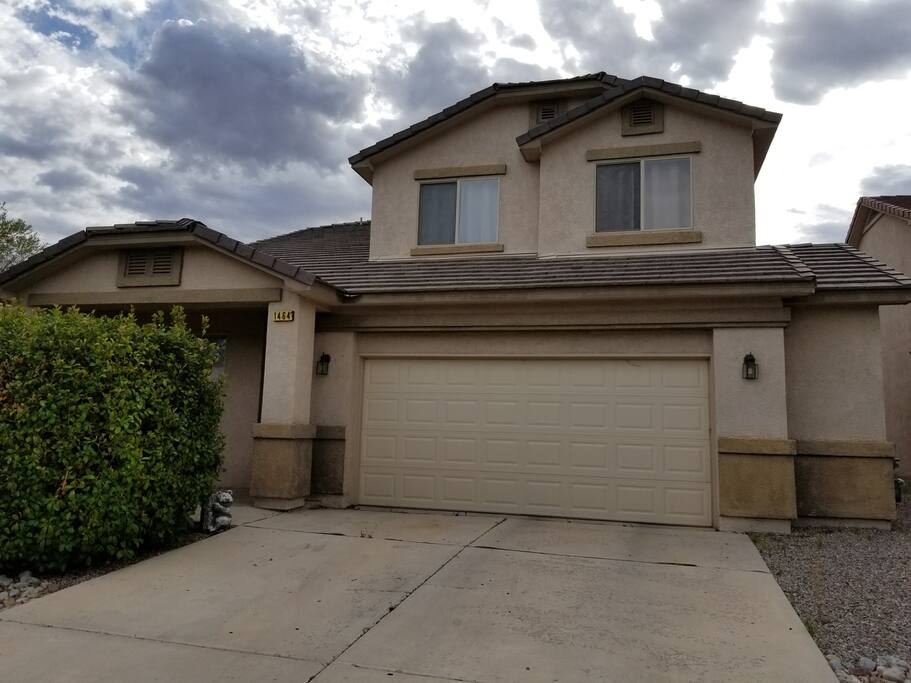 Front of House and you can park on driveway (left side, closest to bushes)