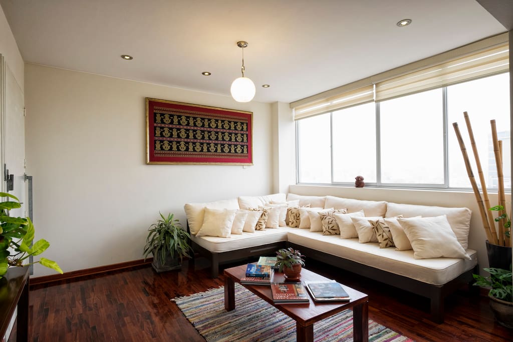 Relax in the bright and comfortable living room area.