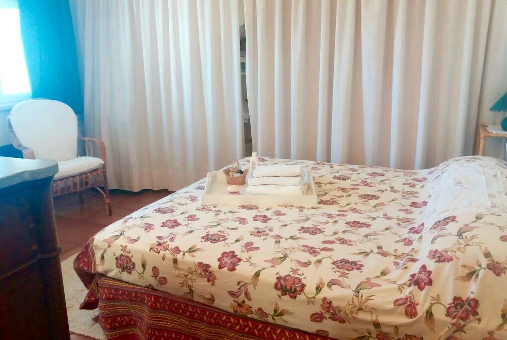 double bedroom with bathroom and shower