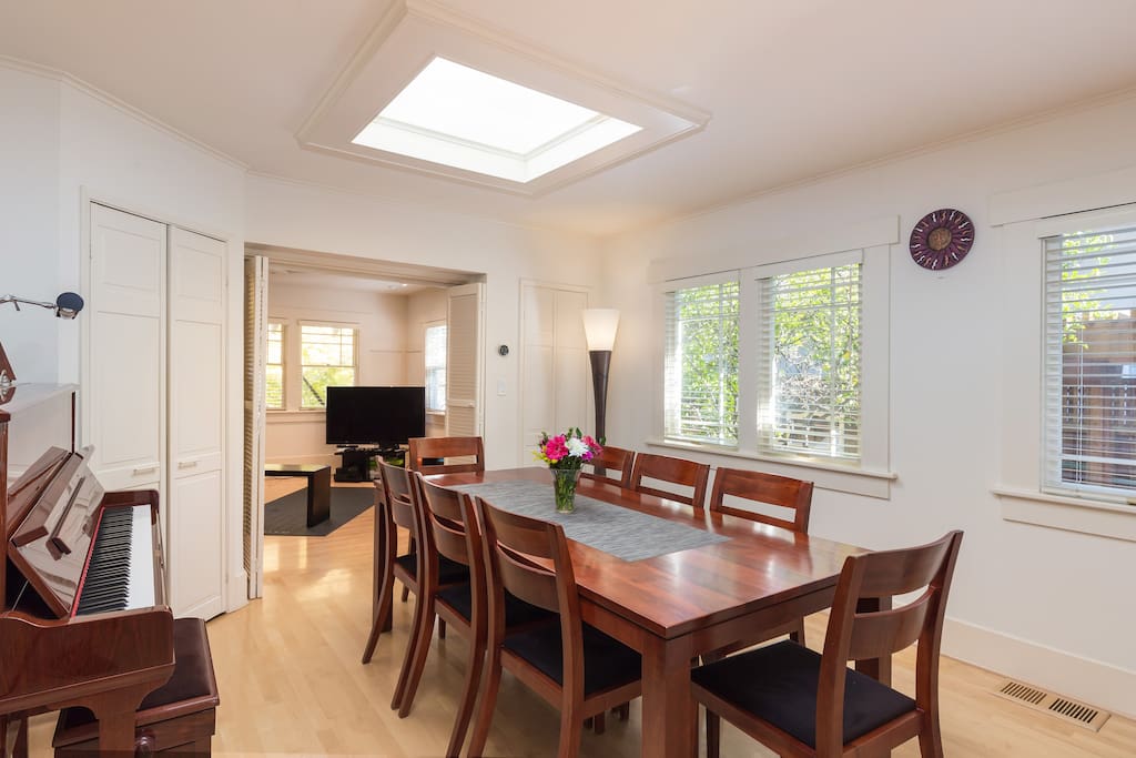 The dining room is also bright, and includes a piano for the musically-inclined