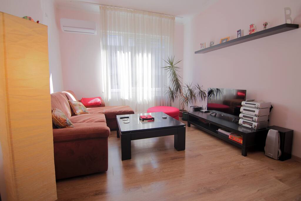 Our cozy living room with sofa bed will make you feel just right at home
