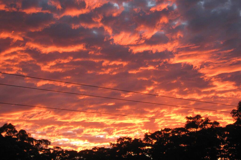 SUNSET OVER THE FARM