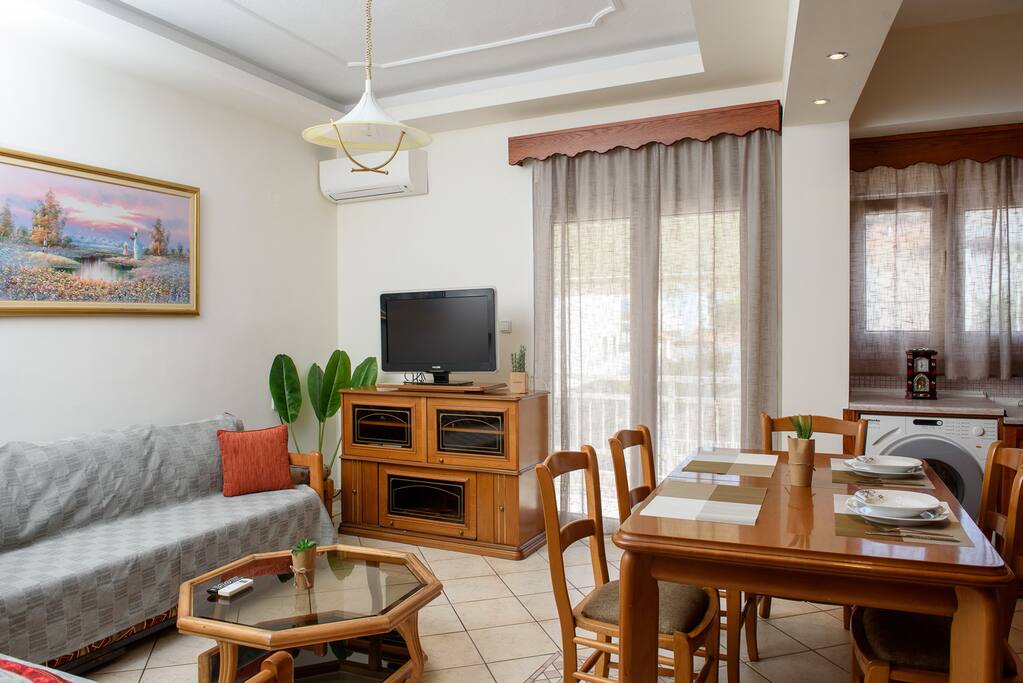 sitting room with comfortable sofas and led tv
