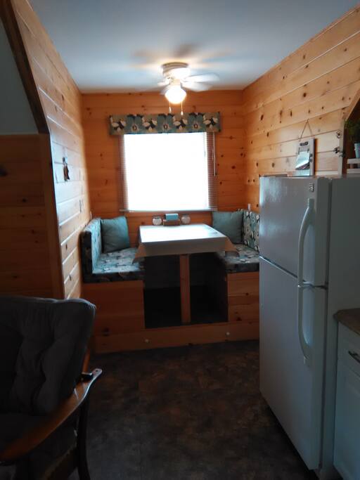 Eating area that will fold down for another sleeping spot.
