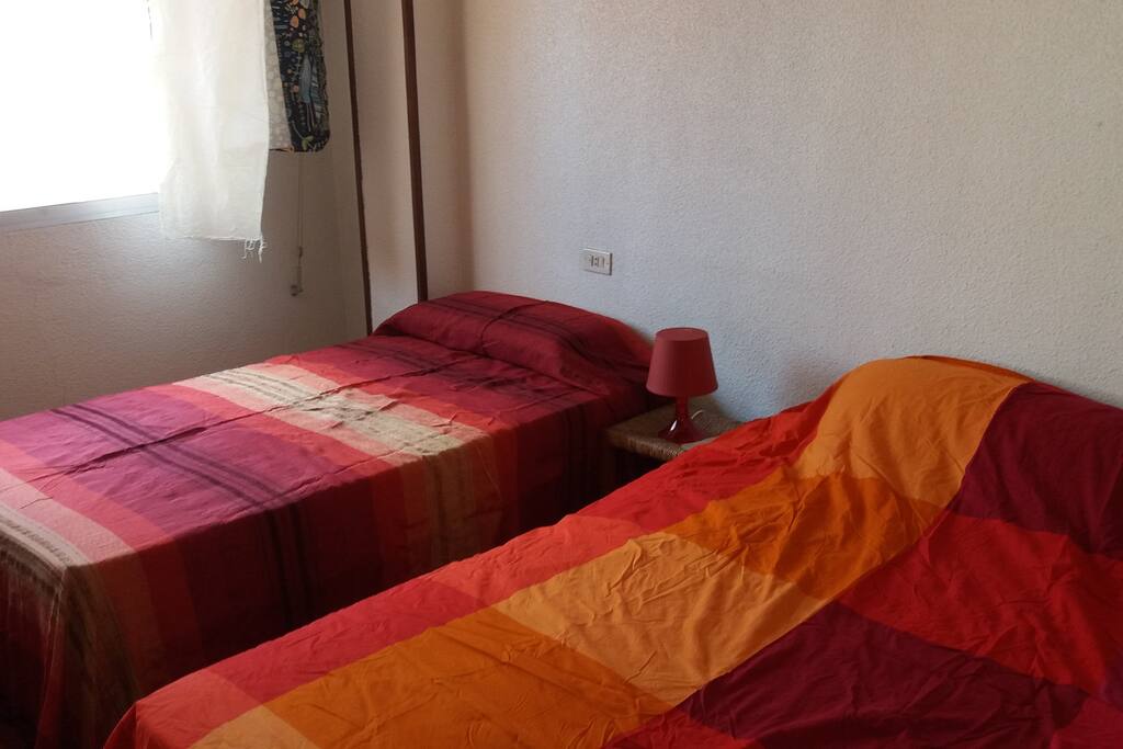 Bedroom with a very big closet. You can see the great statue of Jesus Christ very closely from the window.
