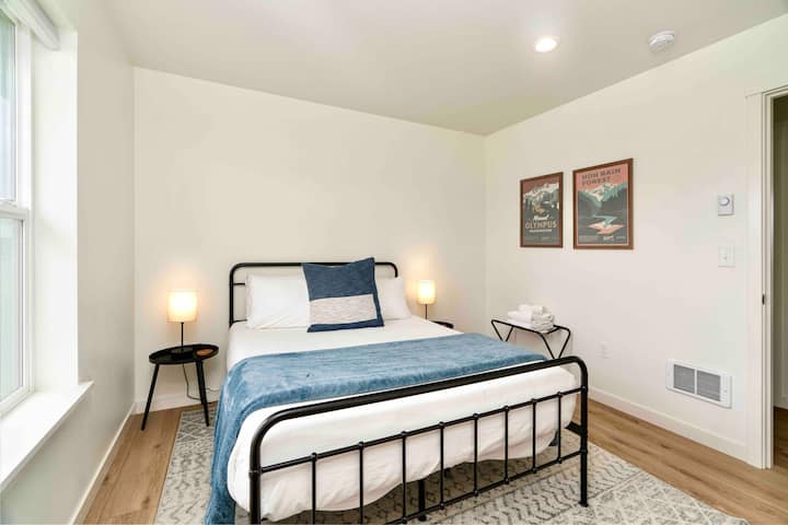 Bedroom 3: Includes a queen bed and a closet filled with toys and children books.