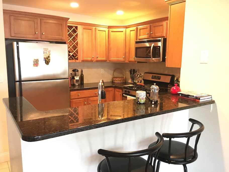 Fully appliances kitchen with breakfast bar