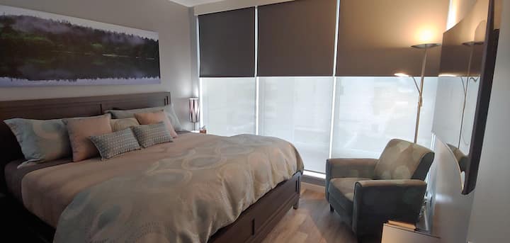 NEW Black-out blinds for both bedrooms and in the main living area! Throughout the WHOLE condo to aid in lessening the light when required: especially for sleep. Guests just LOVE them!