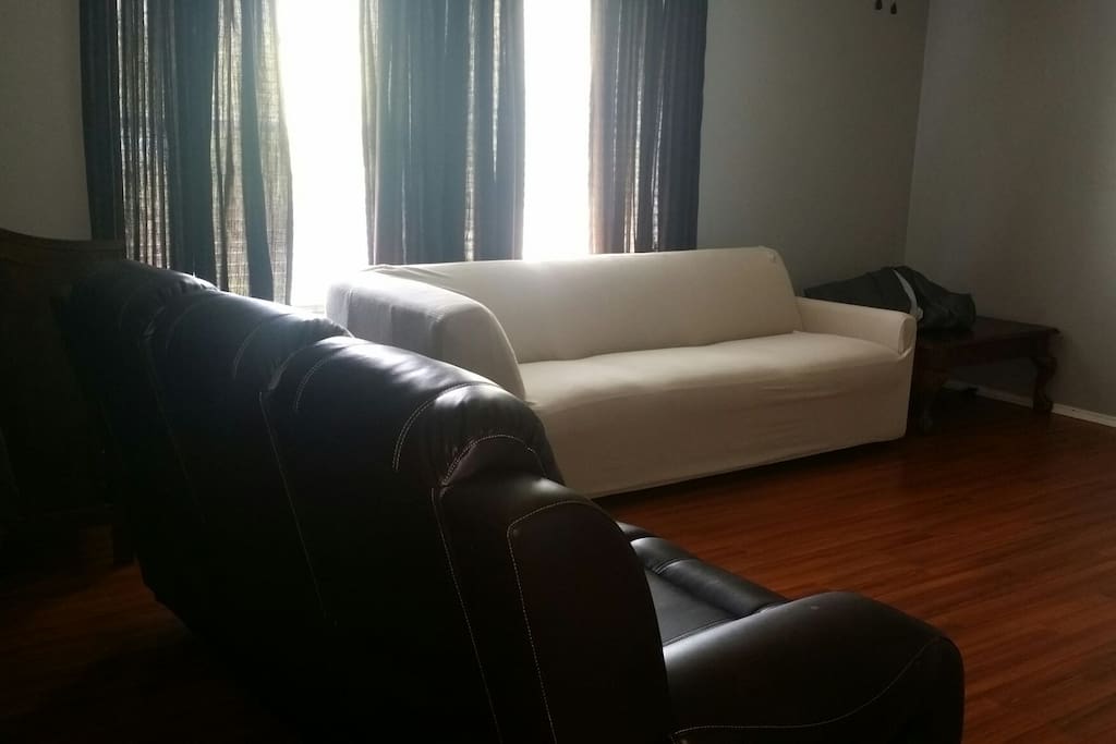 Upstairs movie room; lots of seating with 2 recliners. Movie projector covering 60 to 75 inches