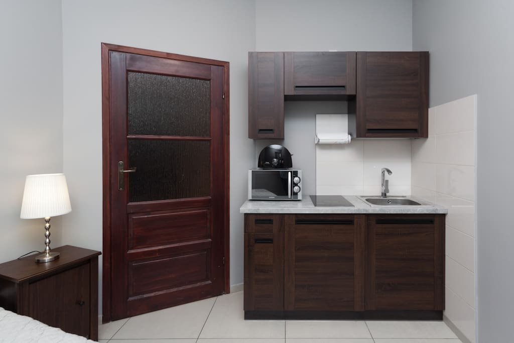Bedroom with kitchenette