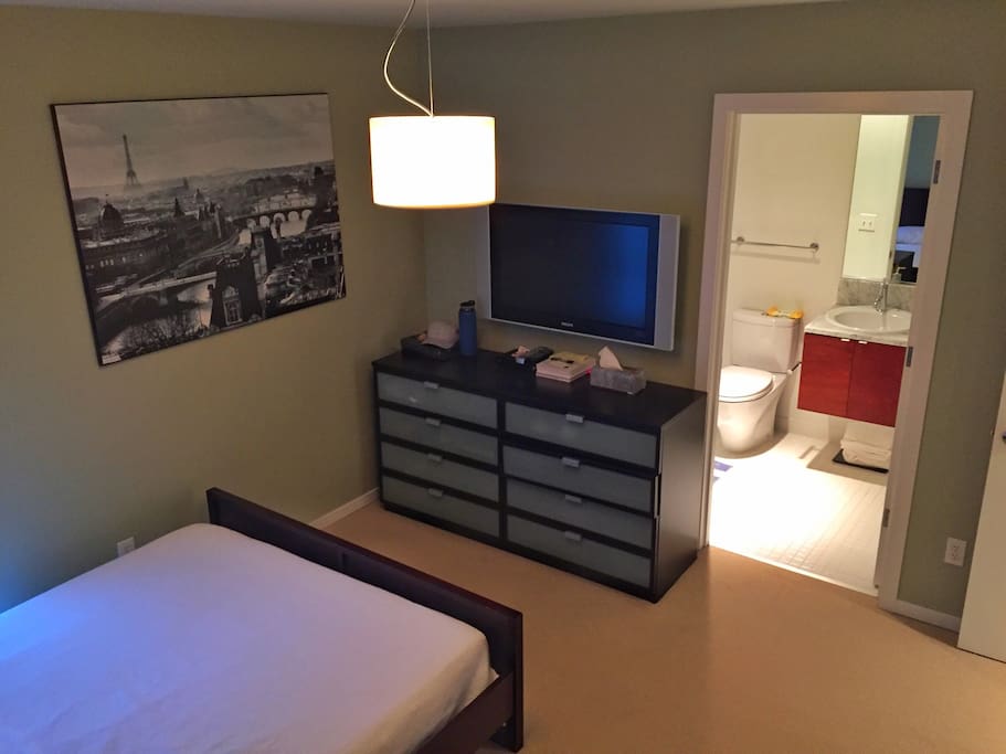 This is your room and private bathroom. Hanging 40" HDTV, Premium Cable Hooked Up, Dresser, Hanging Closet, Washer/Dryer out front.