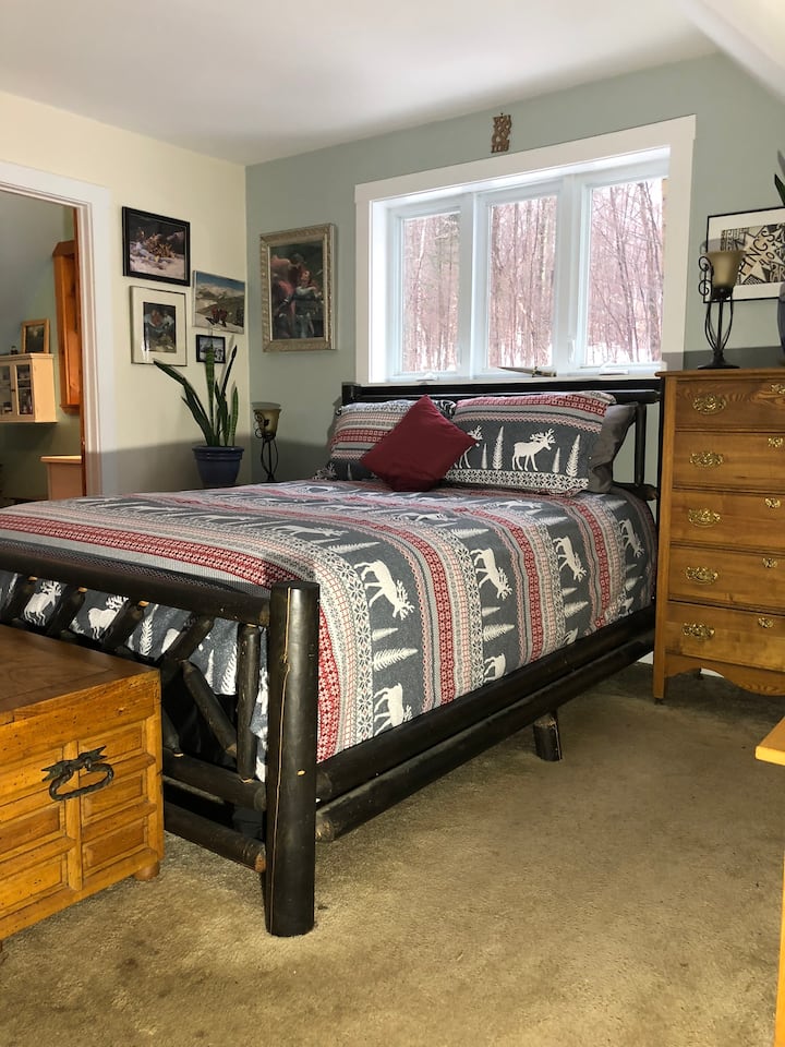 The Master Bedroom features a queen-size bed