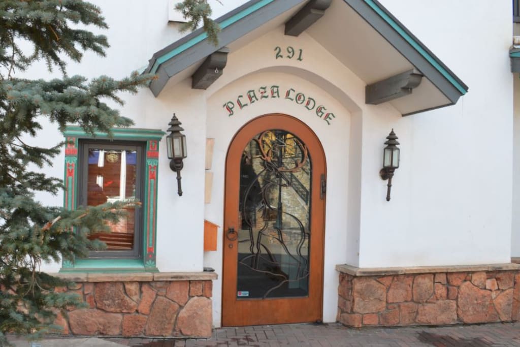 Exterior entrance of Plaza Lodge Building