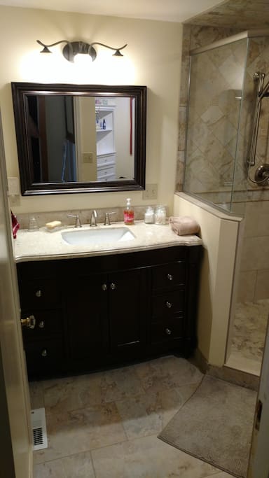 Our well-lit vanity contains many useful items.