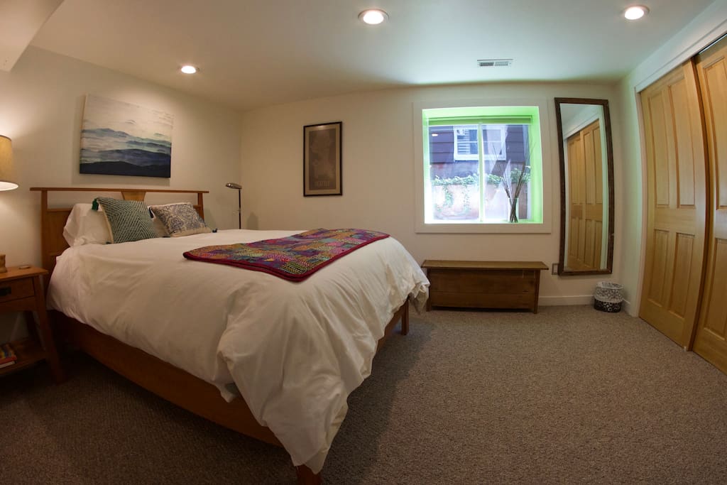 Comfortable queen bed with soft new linens.