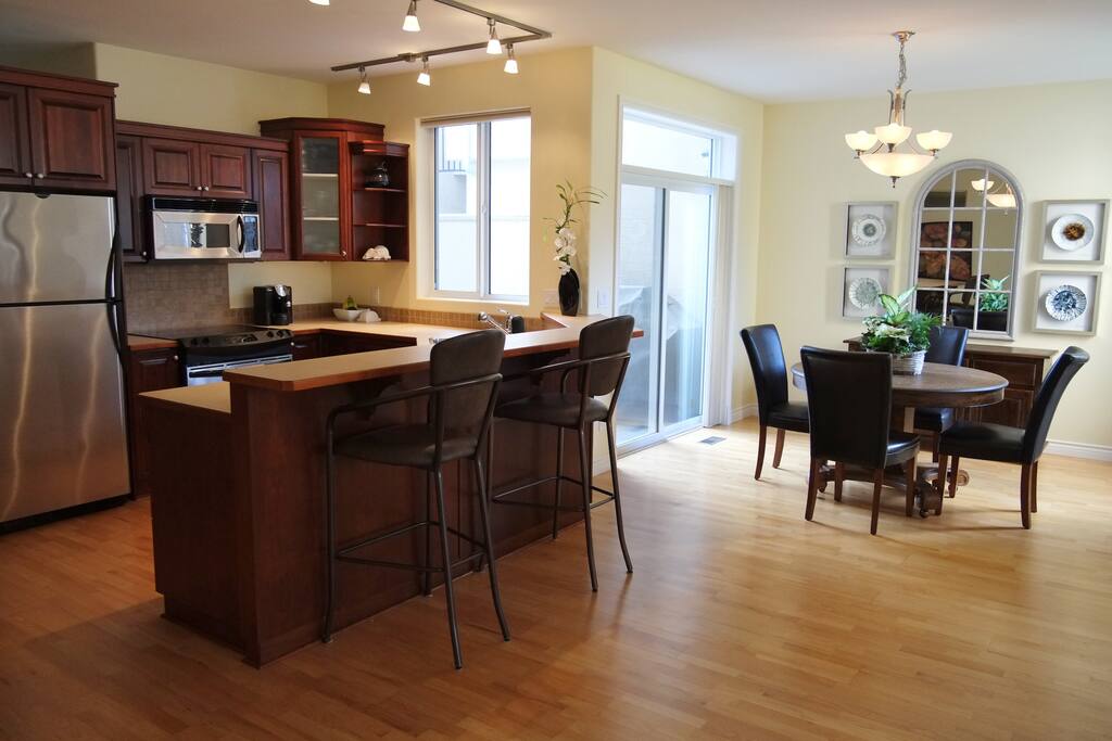 Well equipped kitchen and dining room. BBQ on front patio.