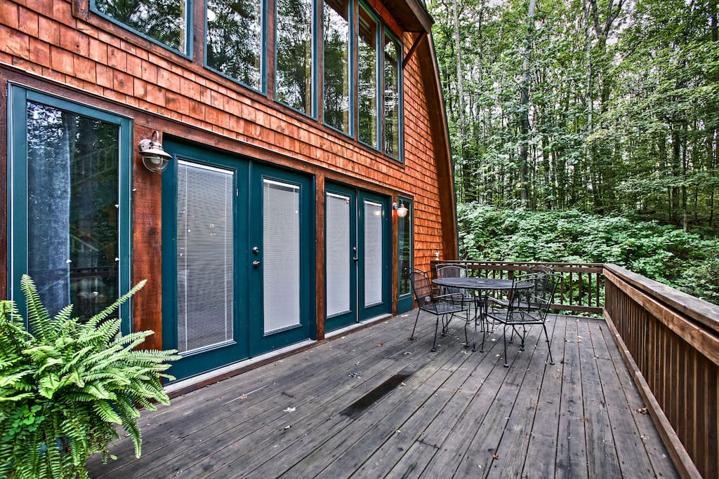 This beautiful barn-style home sits on 1.5 acres of secluded woodlands.