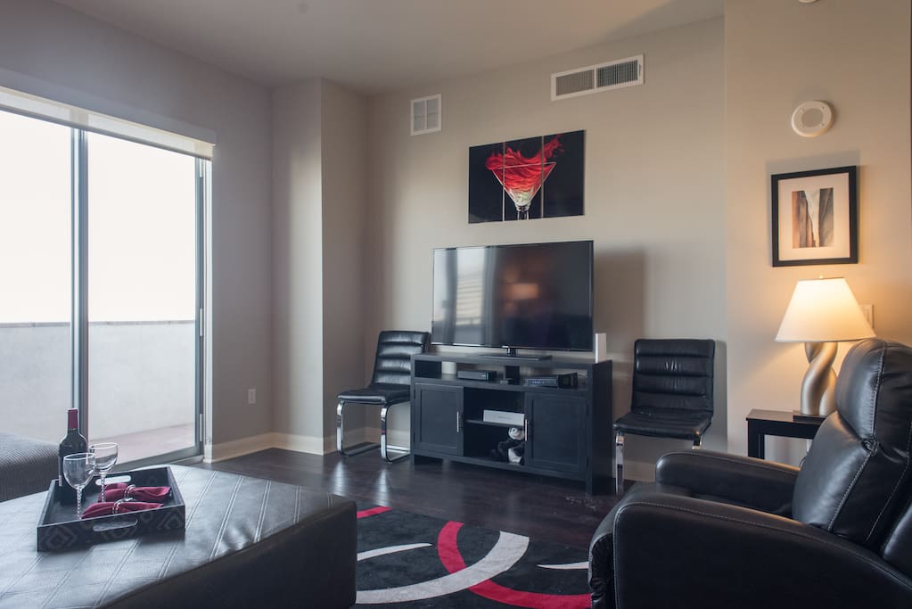 Living Room with 55" Smart TV with Cox Cable HD; Reclining Chair