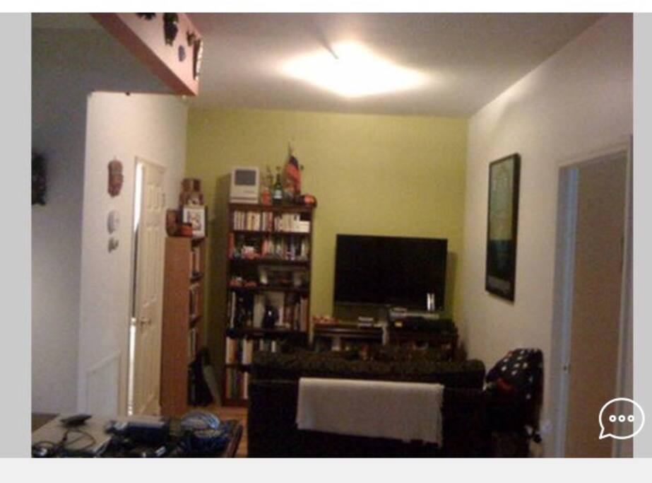 Cozy couch to share. TV but no cable.
