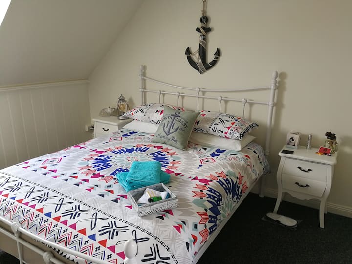 Queen Size Bed with side drawers and additional clothes storage
