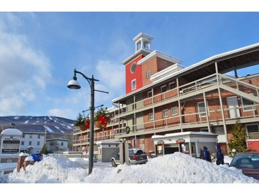 Front of building and owner parking lot