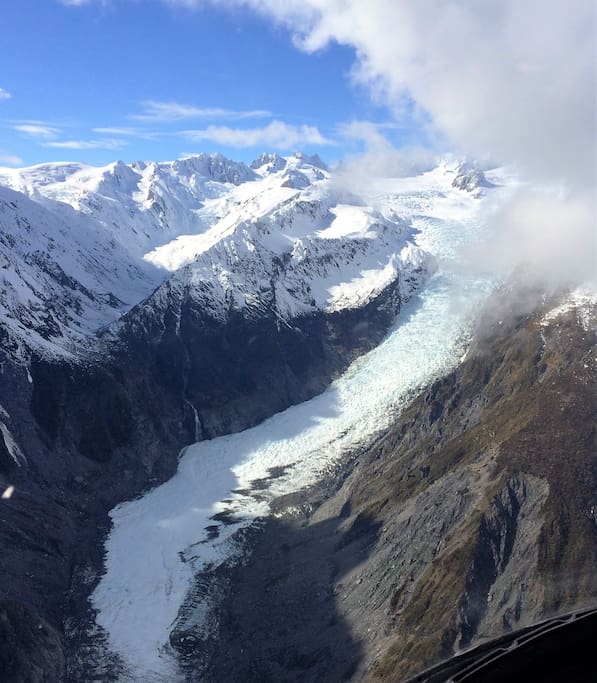 A private charter flight - Franz Josef Glacier from the air looking up to the neve basin.