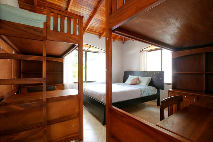 2nd bedroom, with 2 twin bunk beds and 1 queen bed