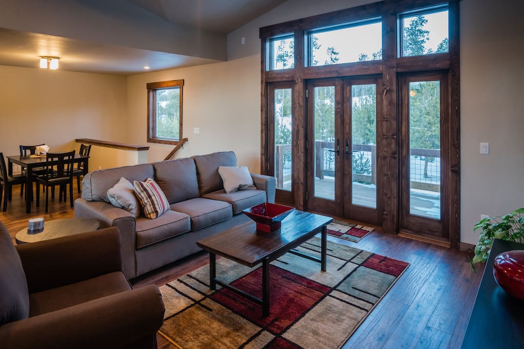 Living room with doors out onto back deck
