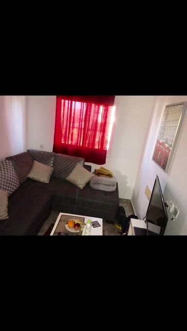 living room: 50" TV, cable television, big sofa