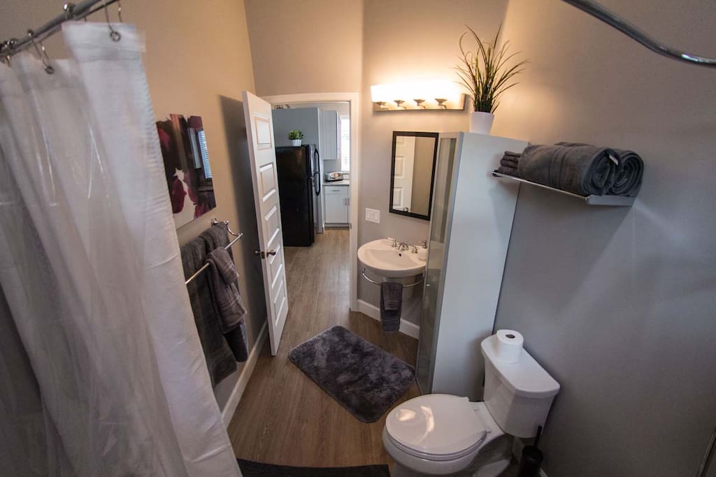 Full bathroom with soaking tub and shower.