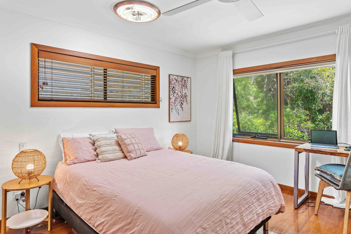 Bedroom 1 with ensuite desk space and monitor for remote working 