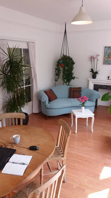Living room showing sliding glass door leading to bedroom